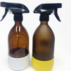 Frosted amber glass soap bottle with trigger and silicon sleeve