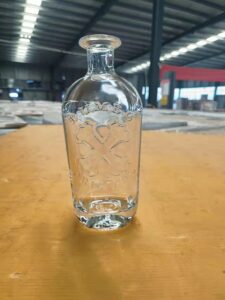 custom liquor bottles embossed logo