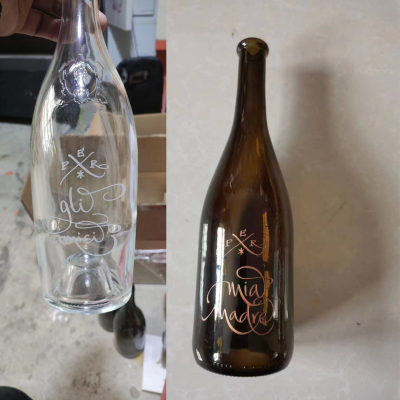 engraved glass bottle with decorations